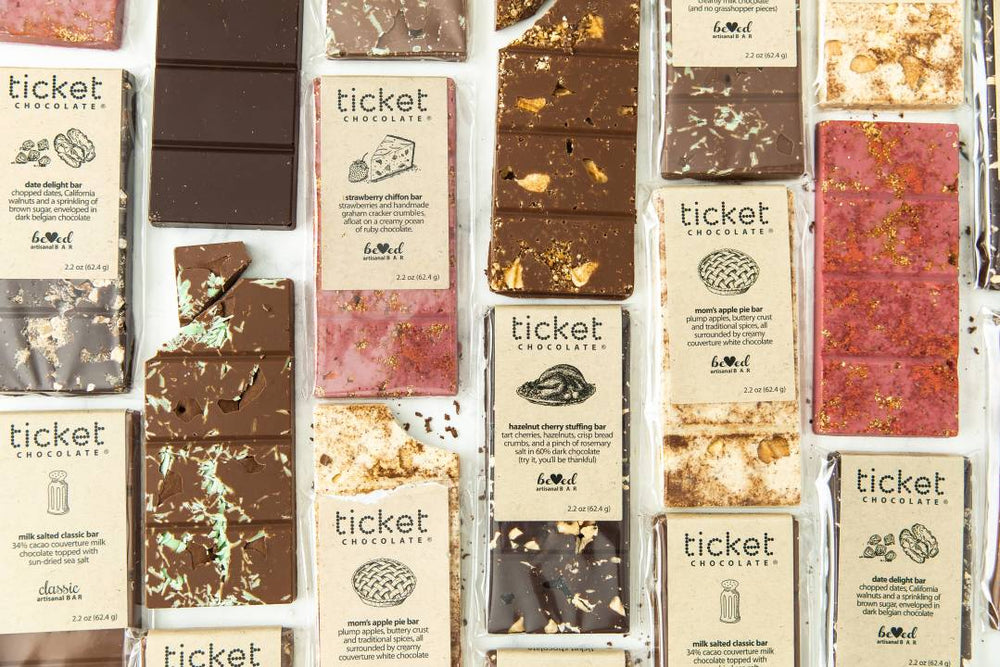 https://shop.ticketchocolate.com/cdn/shop/products/c56de1b07baa1147675b538c1b7a26597a4c0ffc8c30a0df437dfbaa691639ca_48ef3fbd-8208-4f2e-a074-d7c733615a83_1000x.jpg?v=1684767257